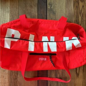 PINK Victoria's Secret neon orange/red duffle bag
